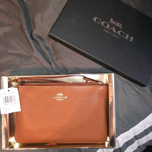 Coach Handbags - BRAND NEW W/ TAGS Coach leather wristlet